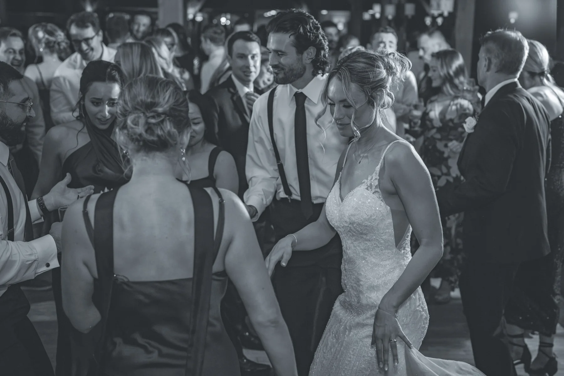 Wedding guests celebrating together on the dance floor at Harrington Farm, Princeton, Massachusetts